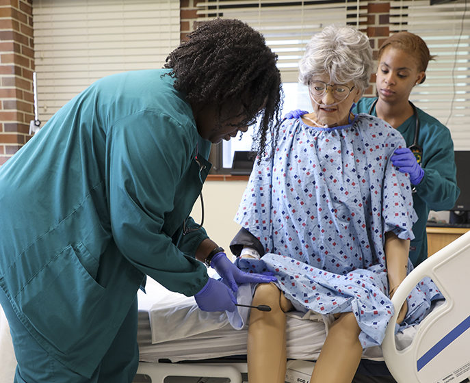 School of Nursing students practice their skills in the simulation lab. (file photo)