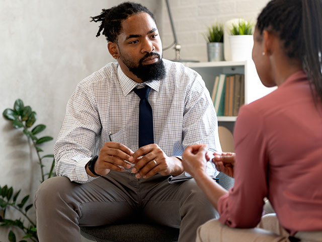 Academic advisor assisting student