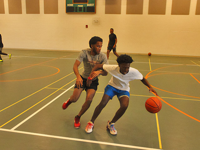 Students playing basketball