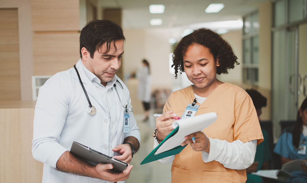 nurse faculty going over comments