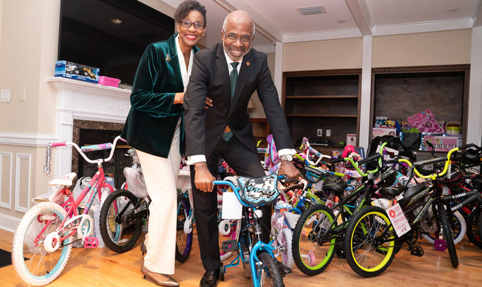 President Robinson with First Lady Sharon at their Toy Drive with kids bikes