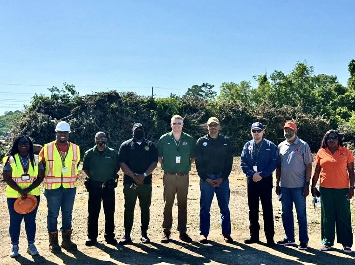 Florida DEP Secretary Shawn Hamilton (fourth from right) visited the FAMU debris collection site Thursday. (Credit: FAMU Emergency Management)