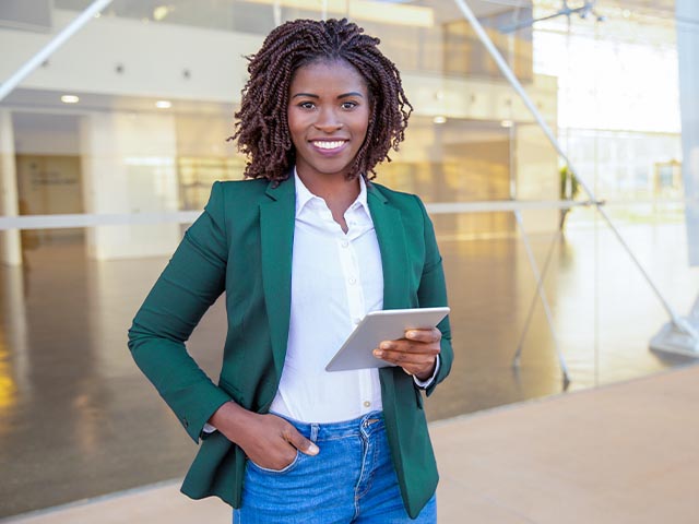 FAMU employee holding ipad