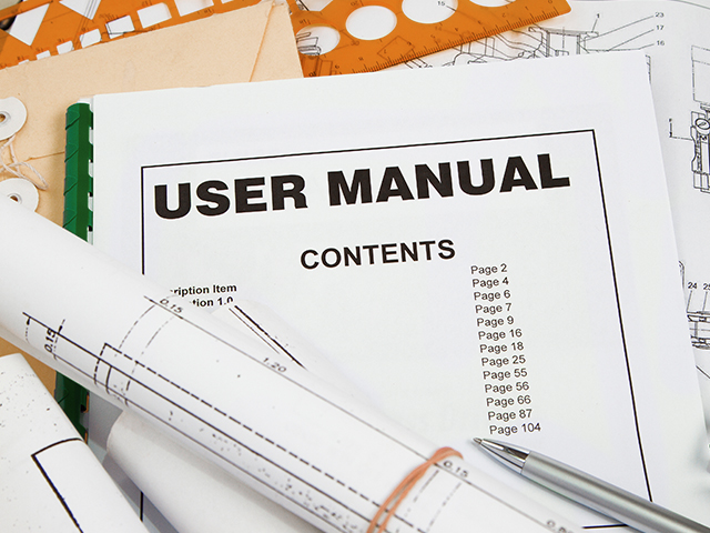 User manual guide brochure with blueprint and pencil