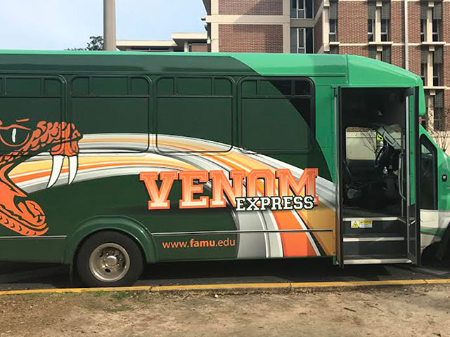 A Green FAMU "Venom Express" shuttle bus
