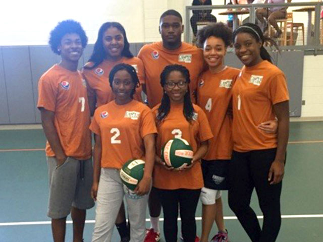 Womens volleyball team playing a match